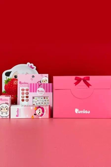 pink color paper box with five products inside- lip balm, 2 nail art stickers, pink nail polish and strawberry mask sheet
